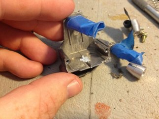 To fit, you first have to grind away a smal portion of the rail that goes from front to back. This holds the springs in on the Mato.