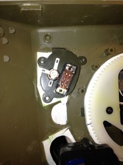 You remove the cover on the tamiya on off switch and remove the wire.  We are going to create a new on off circuit through the battery leads.   Solder the Tamiya power switch wire together to close the circuit.