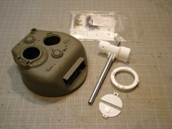 Stock Tamiya turret, Nick Aquilar Mantlet, 75mm gun, split hatch cupola, Schumo brush guards, oil reservoirs, styrene back plate, and suspension upgrades.