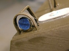 I chose to use the stock plastic parts that have been thinned to half their original thickness