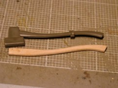 Plus the kit part is molded as one with the tool holder, so I cut it off and filed the axe head to shape.