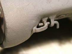 I used Nick R.'s resin cast transmission cover which features a double eyelet design
