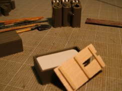 I searched the internet and found decent pictures of individual meal meal boxes (Breakfast, Supper, and Dinner) and they were in very colorful boxes. Armed with these pictures and using the stock Tamiya "wooden" crates my plan was to have one completely sealed crate, one that has a broken lid that you can see the crate's contents through the broken wood slats, and a third crate that has the top completely removed and some of the individual rations boxes removed.