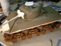 Also "mocked up" Nicks resin cast mantlet and aluminum turned barrel. It's designed to work in conjunction with the stock 105 mount but you can see gaps behind it. I may have to follow in Ethan's footsteps and use the rotor shield scabbed off of a 1/18th scale 21rst Century Toys 75mm Sherman