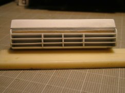 Once the lower portion of the box was done, I used .020 styrene to skin the front and top section of the box. Finally I went back and added .125 verticle stiffening ribs to the louvers.