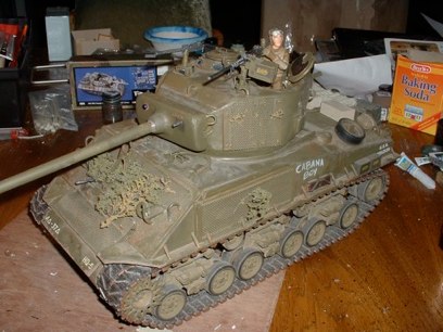 More weathering and machine guns added.  Now it has three .30 cal and the Ma Duece. Paint is testor’s regular OD rattle Can with acrylic washes and real dirt.