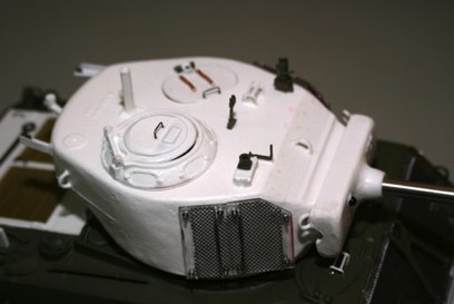 More turret details.  I added the Tamiya sights and machine gun mounts but scratchbuilt the loaders hatch details.  (I KNOW the Vane sight is backwards here... It got fixed later.)