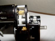 The Schumo kit includes a spacer to pull the motor into alignment with the first stage gear. The Kit ETO sells does not include a spacer.