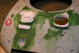 Liberal use of squadron green putty and sand paper has allowed me to begin thinking of where the armored louvres will go.  I will build them out of styrene and they will be completely cosmetic.