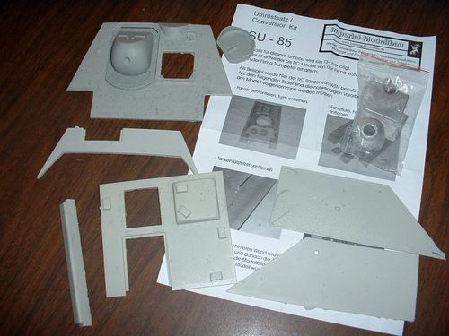 The gun mount and resin fighting compartment require more work to modify than I am willing to do.