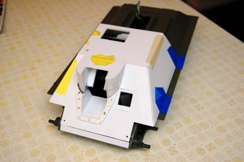nitial fighting compartment in place and glued to Trumpeter hull.  Work continues on the exterior of the gun mount.