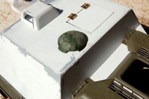 WSN has the double ventilator on its T34/85 so I cut it up to create the single round ventilator for the SU-122.  Some super glue and a sanding stick adds rough texture and cleans up the seam.   Now to build the drivers hatch.