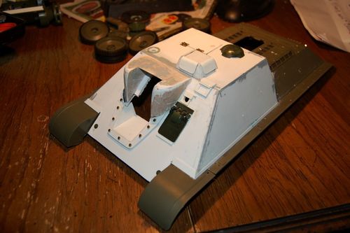 I used the hatch from the WSN kit as a base and basically made it smaller while retaining the hinge.  I made the periscope hood by cutting two of the WSN pieces and grafting them together.