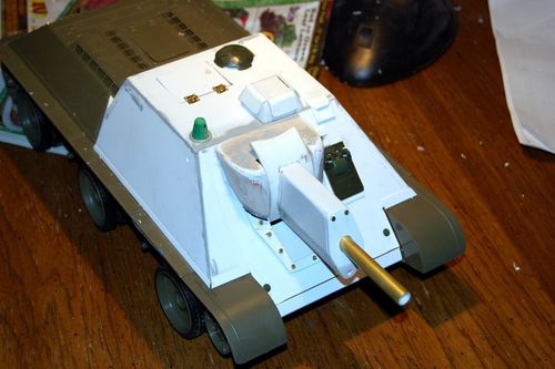 I made the conning tower flaps from styrene and will make the hinges from styrene.  They will not open.