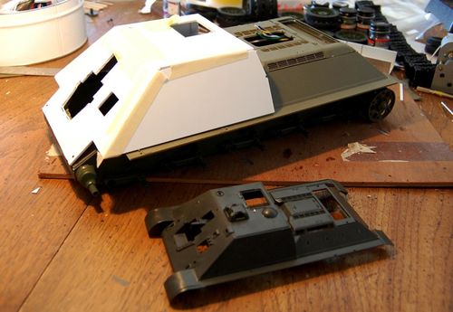 I fudged the angles a bit to fit the Trumpeter hull.  Do I put the fenders on or off?  So far so good on the boxy fighting compartment.