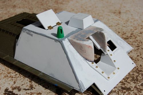 I filled some of the larger seams with Tamiya putty to even out the panel lines before I add the welds.