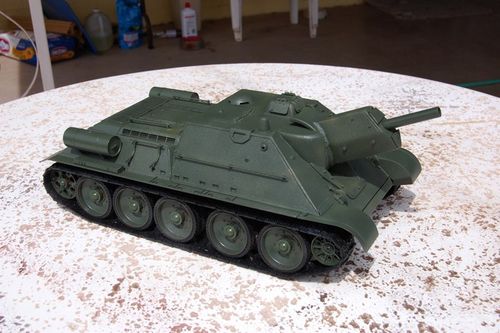 I added the wheel hubs and transmission covers and am now working on the external stowage.  After a bit of refinement, I used some Rustoleum textured paint to resurface the fighting compartment.  After a new coat of Russian Armor Green I am very pleased with the results.