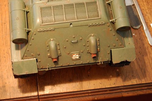 I added the exhaust pipes with my custom baking soda rust and bolted the assembly back together.