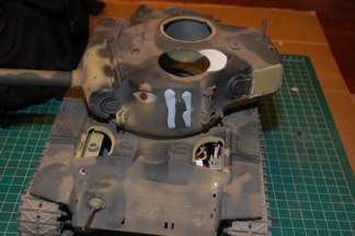 More turret mods, the pilot vehicle had a different spare track arrangement so filling the existing rails was necessary.