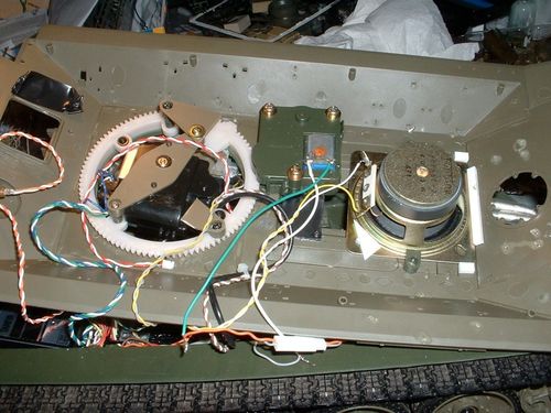 Battle unit and crew figure mounts from the spares box are used to build a recoil mount in the turret ring.  I have purchased Tamiya full option elevation and recoil units off ebay.  I even bought a King Tiger speaker box.
