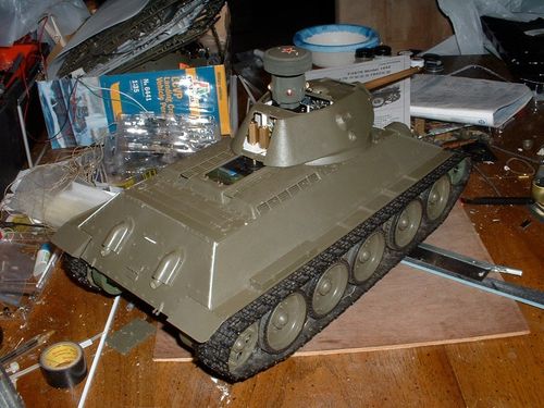 More cleanup is done to the hull and I added several weld lines of .30 plastic rod melted with MEK.  I also added counterweights to the turret to balance the heavy brass barrel.  One big change is to the fit of the upper and lower hull.  I removed the static kit’s sponsons to and attached them to the WSN hull.  The 1/18 inch gap between the halves is now filled.  It also helped alleviate the warp in the WSN hull and holds the halves together.