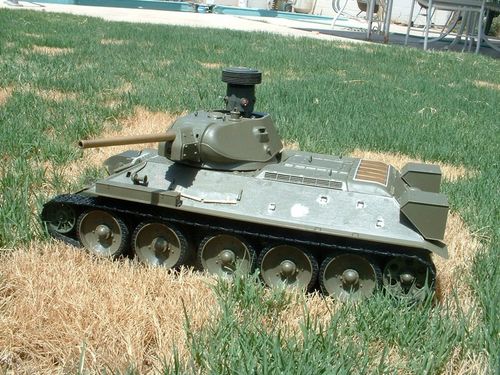 Time to run the tank!!  I dispatched it to my back yard and let loose.  It handles great except the right rear bogies seem to be sticking and the track occasionally grinds on sharp turns.