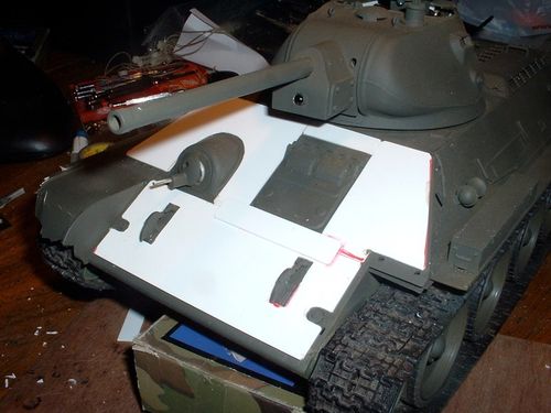 Time to add bow and co axial machine guns.  I simply stuck the fiber optic through the Trumpeter assembly and into the LED.  It fit perfectly the first time.  It even moves independently like the Pershing .30 cal.  I placed the Battle Unit transmitter in the recouperator housing below the barrel.  Purists will criticize me but I felt placing it in the sight opening would limit the field of fire.  So far it can fire just fine.