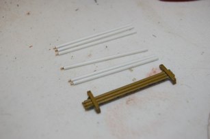Xtreme detail time.  I will replace the gun bore brush handles with styrene tube and bits of 00-90 treaded rod.  This was very easy and can actually be threaded together!