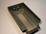 Construction of the lower hull and suspension parts is pretty straight forward. Tamiya engineered the independent suspension using flat straps of spring steel to keep the individual suspension arms under steady tension.