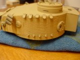 Schumo spare track holders installed on turret.