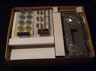 Crack open the box and you get an eye full of RC candy. Lots of metal and plastic sprues. All is neatly and tightly packaged in a well thought out and layed out box design. I found no apparent damage upon initial inspection